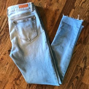 Lenia Woman Distressed Skinny Crop Jeans